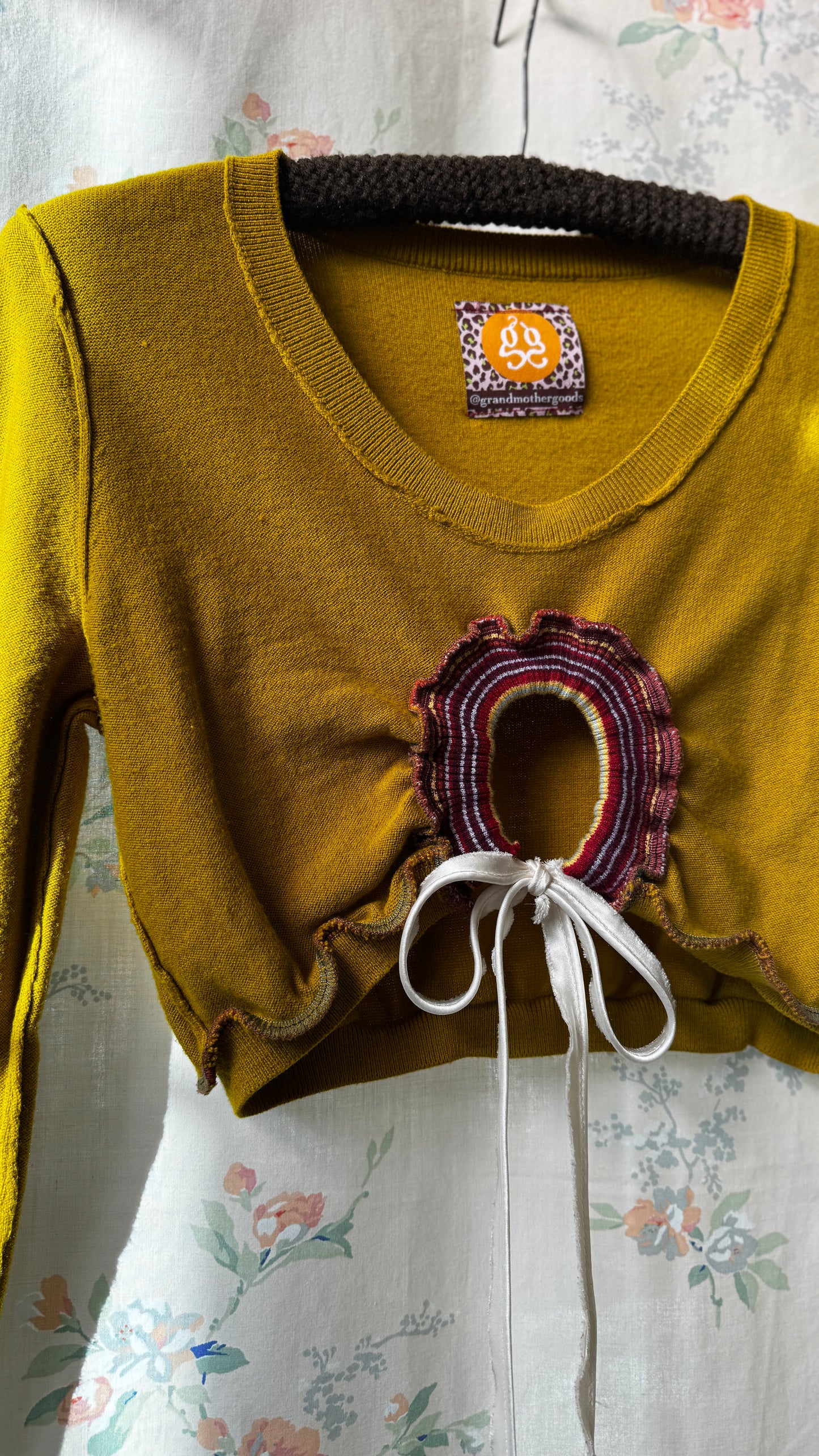 "XANADU" Peek-a-Bow Sweater